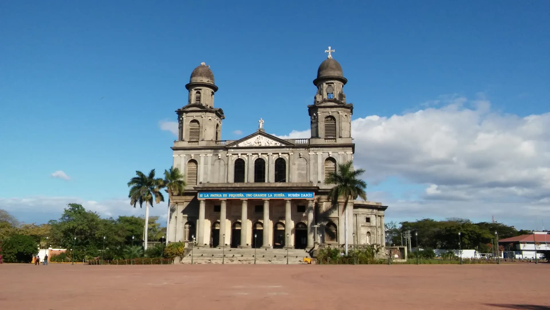 a large building with two towers on top of it