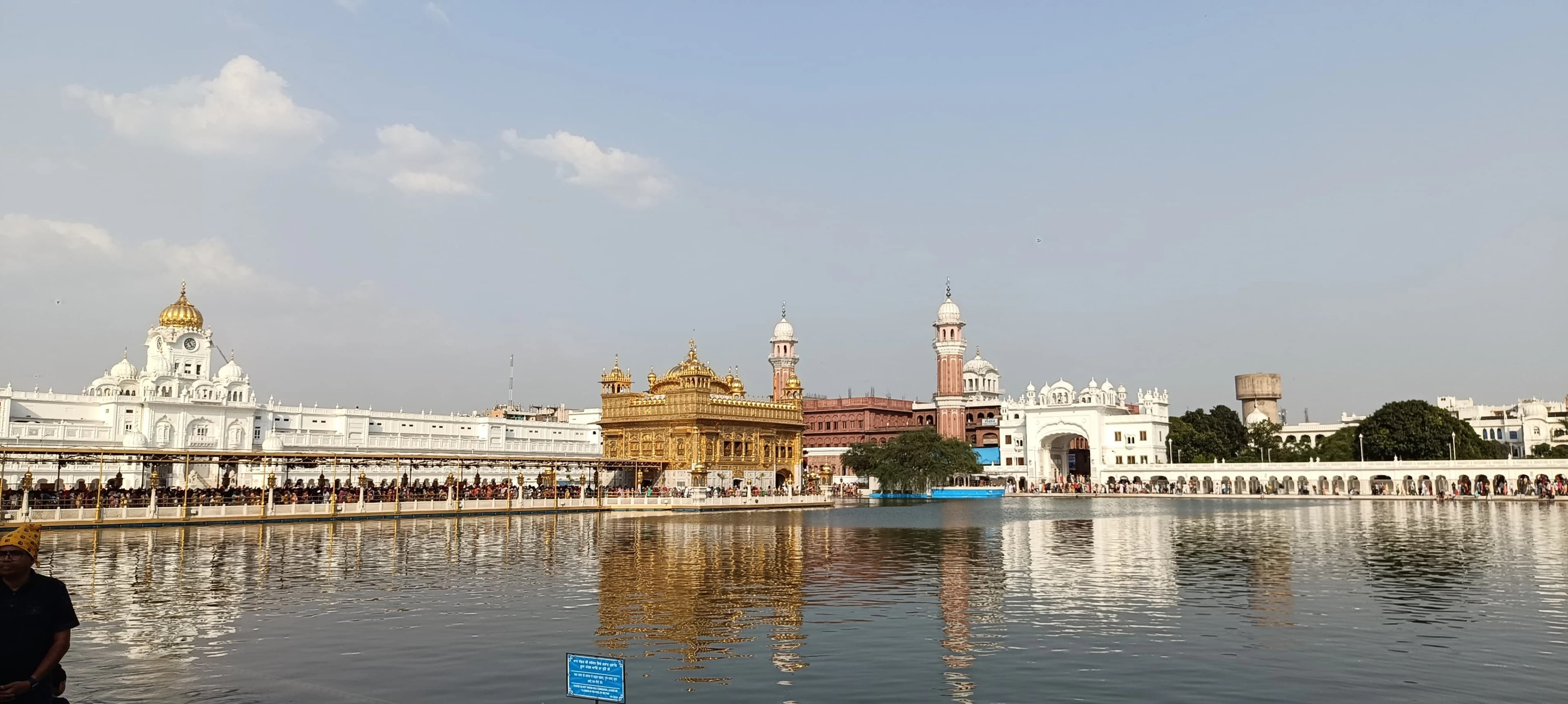 a body of water with buildings in the background