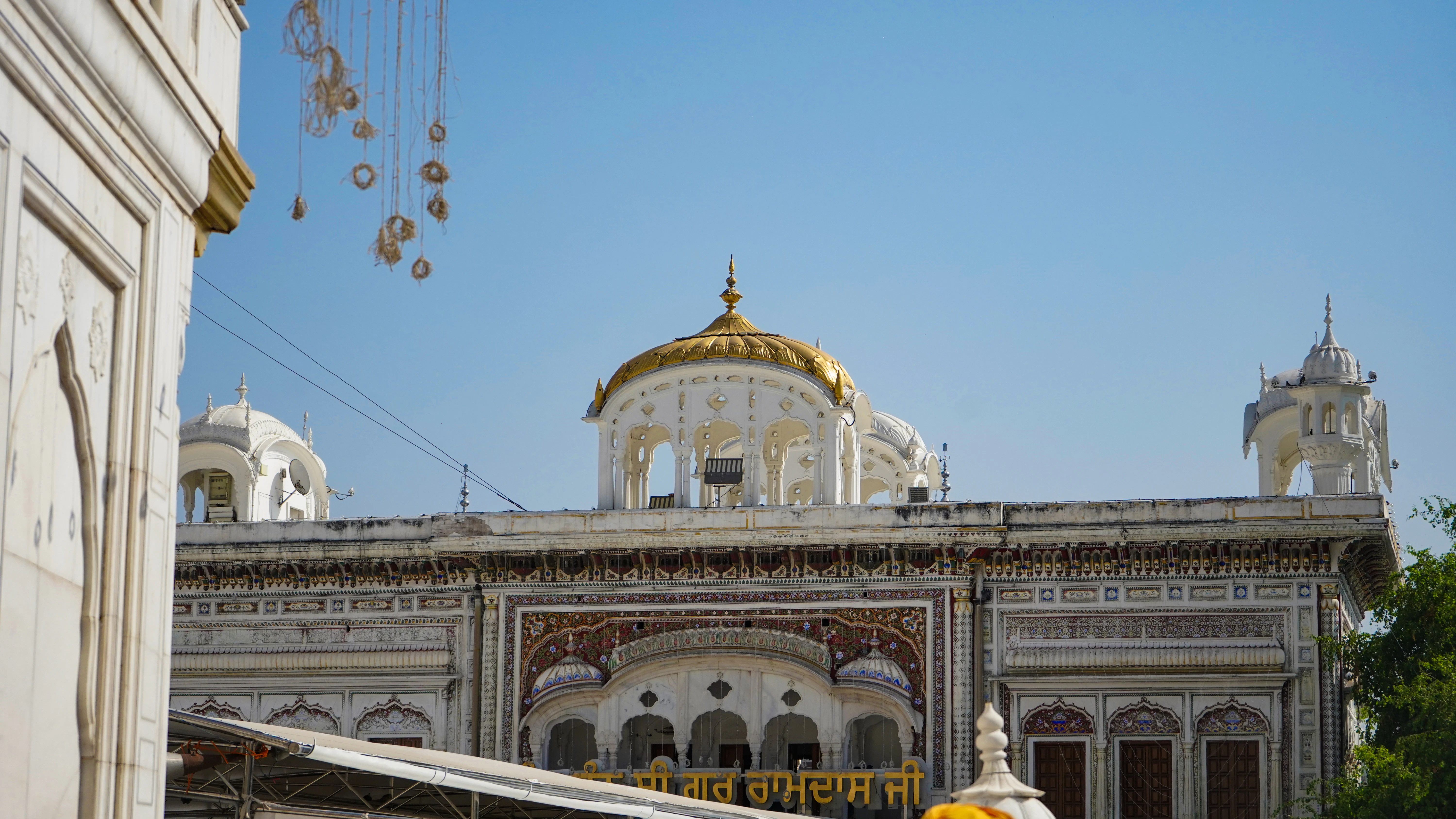 A large white building with a yellow dome