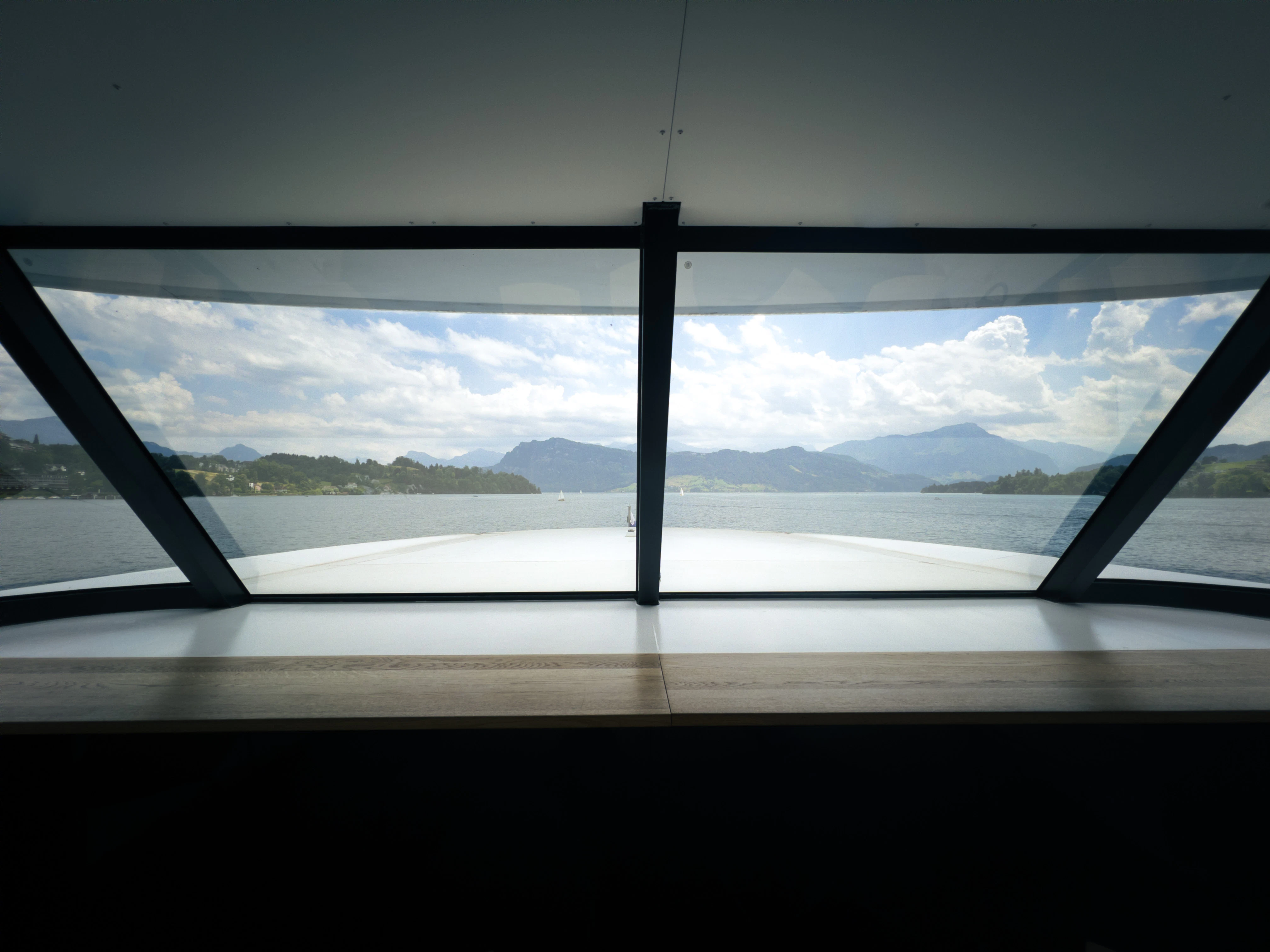 a view of the mountains from a window