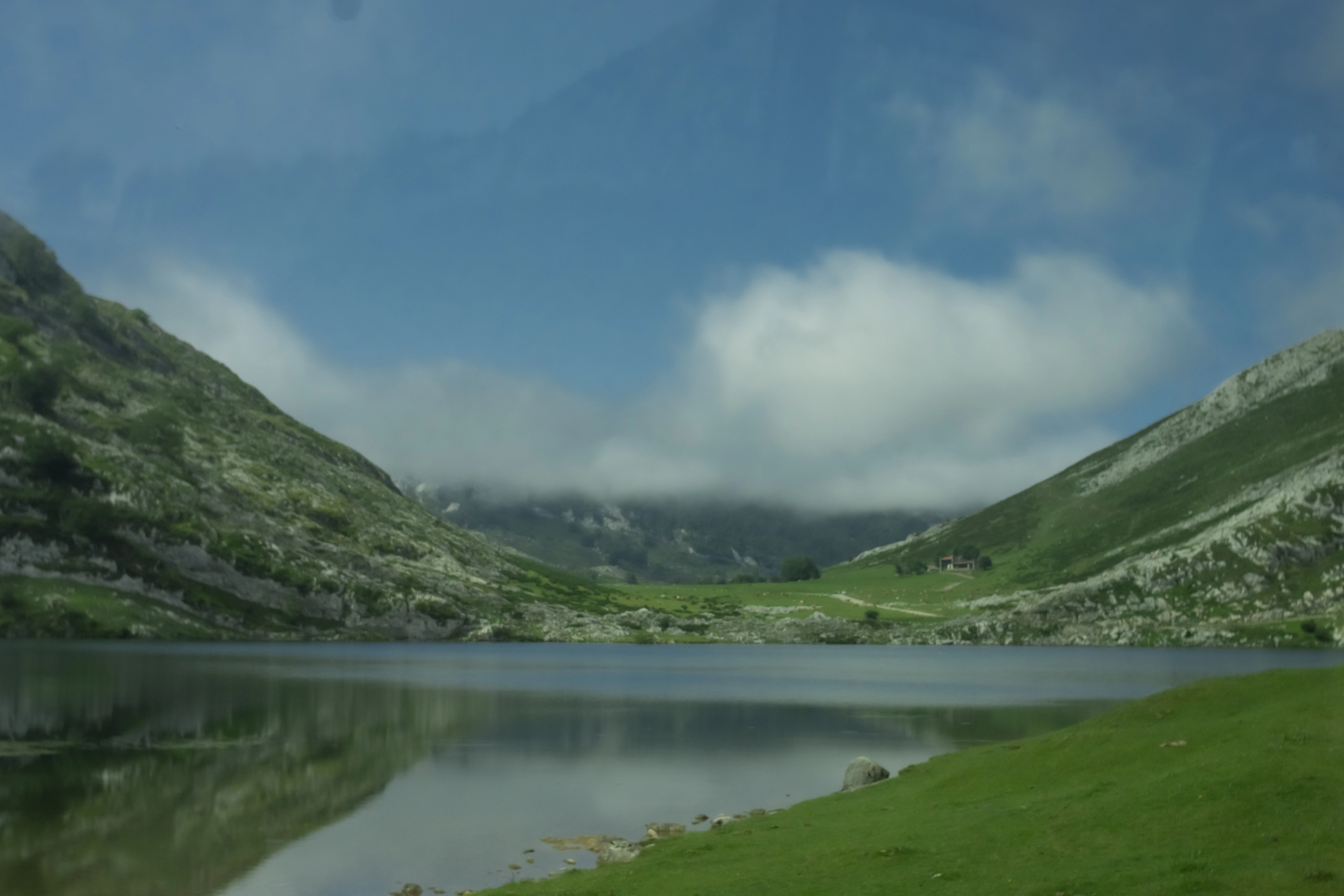 a large body of water surrounded by mountains
